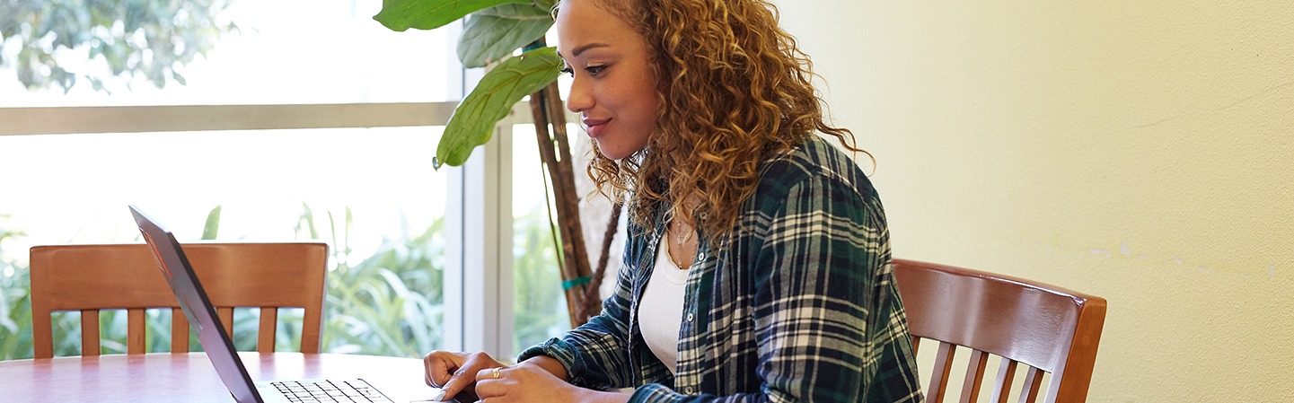 Student with laptop computer