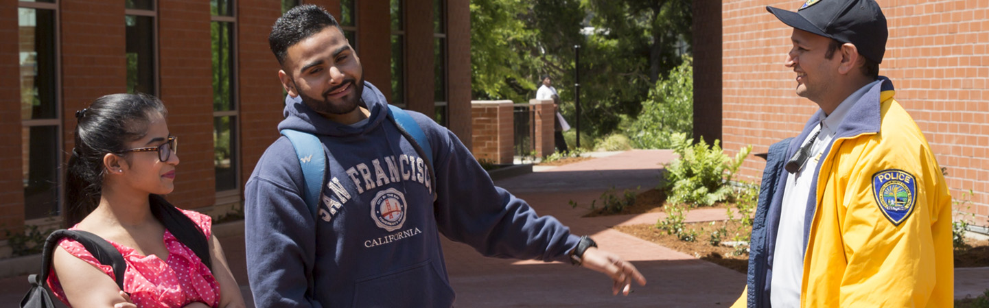 campus police laugh with students