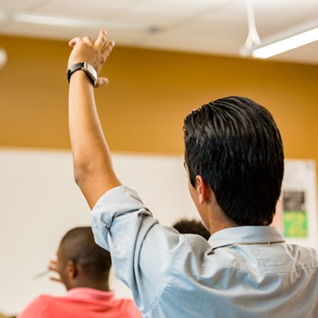 Student with Hand Up