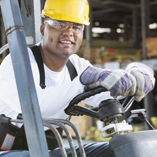 Man driving forklift