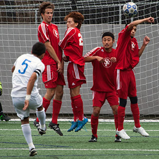 People playing soccer.