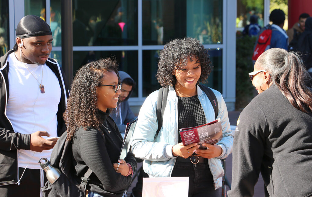 Female students at tabling event